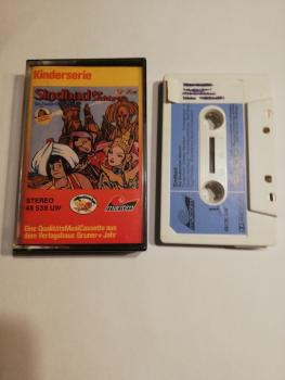 Sindbad Die Zauberinsel Alkenor Grau mit Blauen Aufkleber 48538 UW Maritim(MC Cover Seite 1 beklebt)